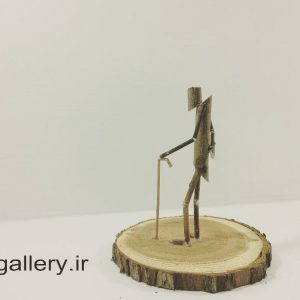 مجسمه دست ساز چوبی پیر مرد